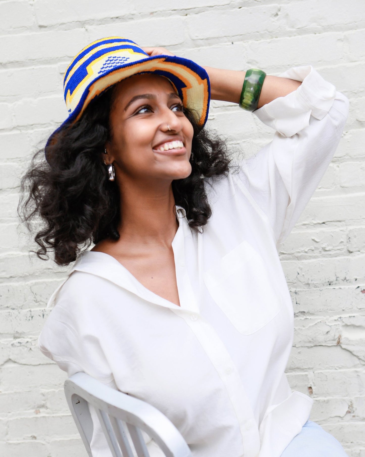 Handmade Ethiopian hat with blue, yellow, cream tones made from cotton and wool fair trade
