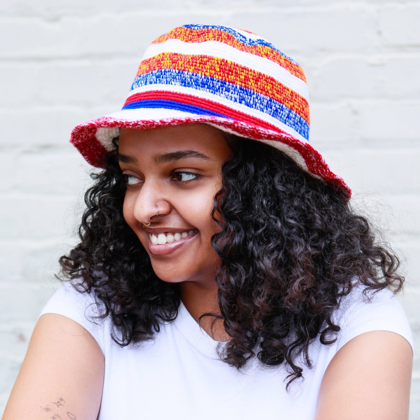 Handmade Ethiopian, hat made from cotton and wool featuring red, white, yellow and blue stripes