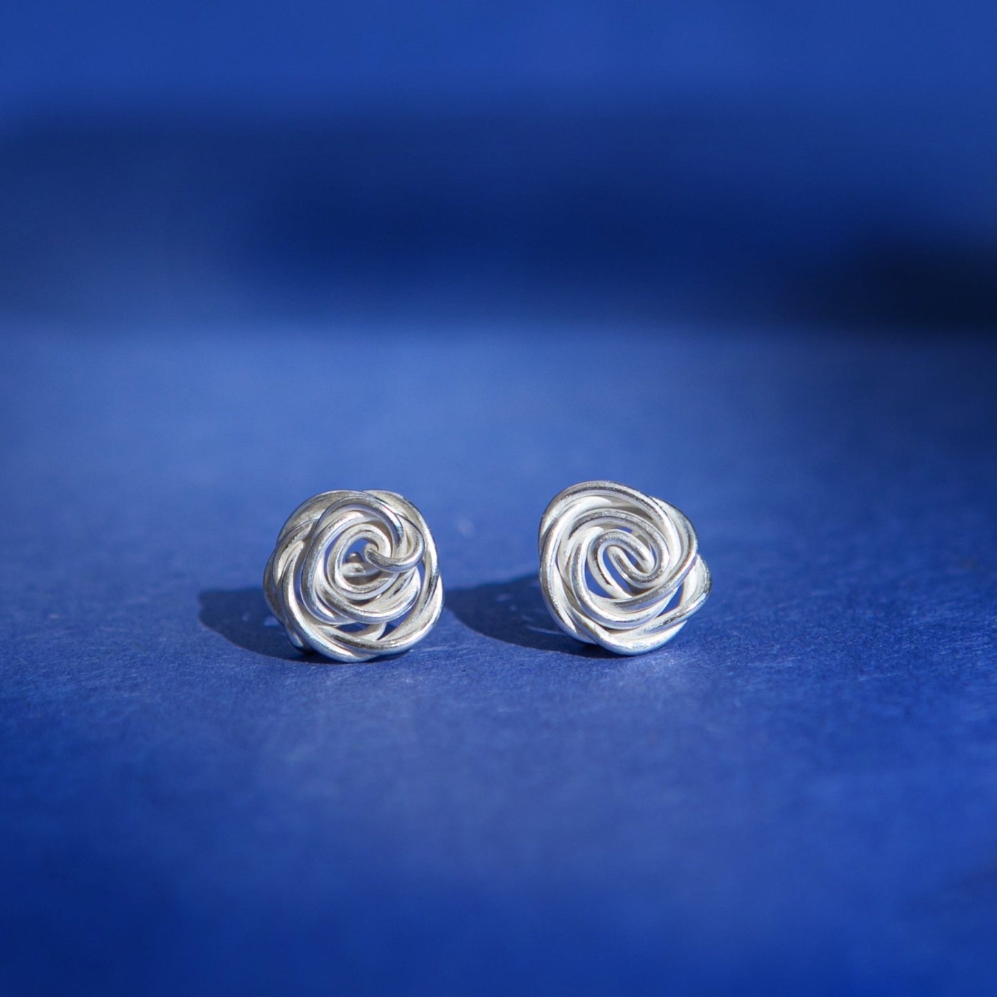 Handmade Ethiopian Silver Rose Knot Earrings Available in Dangle or Stud Options | Artisan Floral Jewelry by Kelem - Kelem Shop