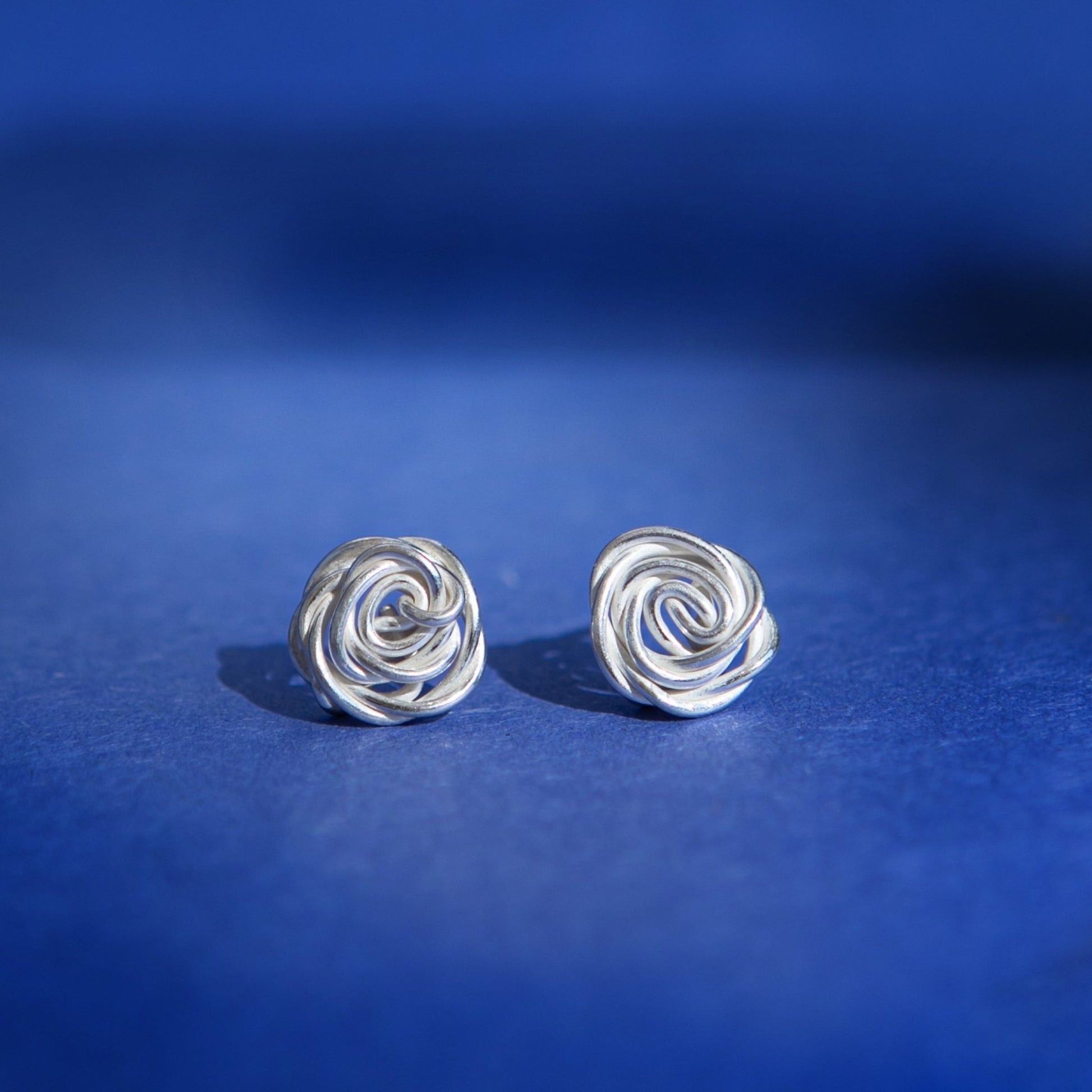 Handmade Ethiopian Silver Rose Knot Earrings Available in Dangle or Stud Options | Artisan Floral Jewelry by Kelem - Kelem Shop